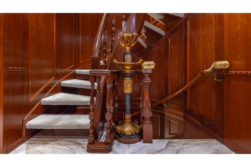 Slide: The Image of Luxurious wooden staircase with ornate railing on 2001 TRINITY Tri-Deck MY yacht. - 19
