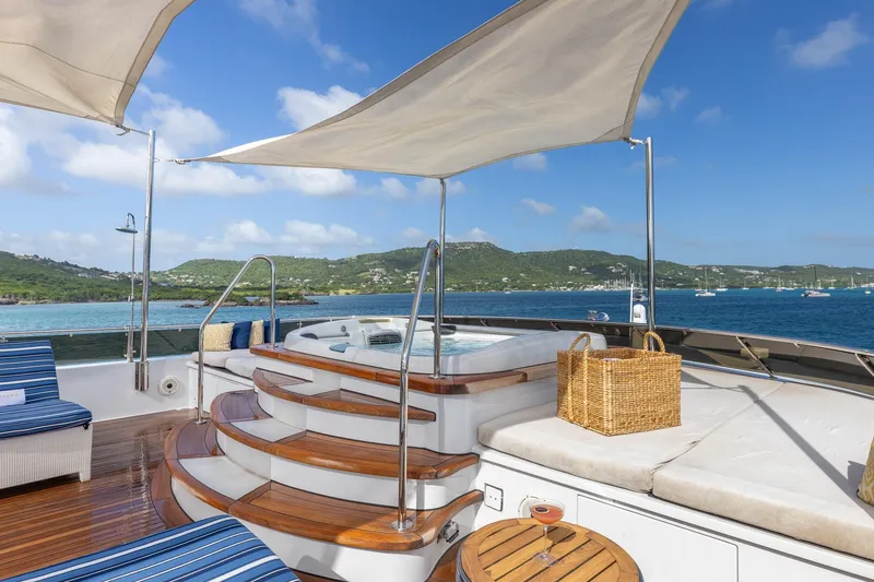 Slide: The Image of Luxurious 2001 TRINITY Tri-Deck MY yacht deck with jacuzzi and ocean view. - 33