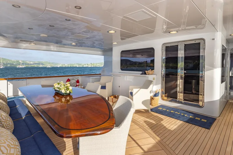 Slide: The Image of Luxurious 2001 TRINITY Tri-Deck MY yacht deck with elegant seating and ocean view. - 38