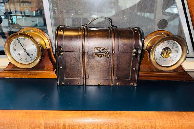 Slide: The Image of Vintage clock and barometer on 1987 Bayliner 4550 Motoryacht dashboard. - 65