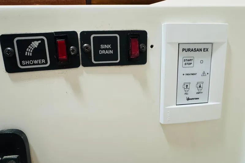 Slide: The Image of Control panel on 1987 Bayliner 4550 Motoryacht with shower, sink drain, and Purasan EX system. - 75