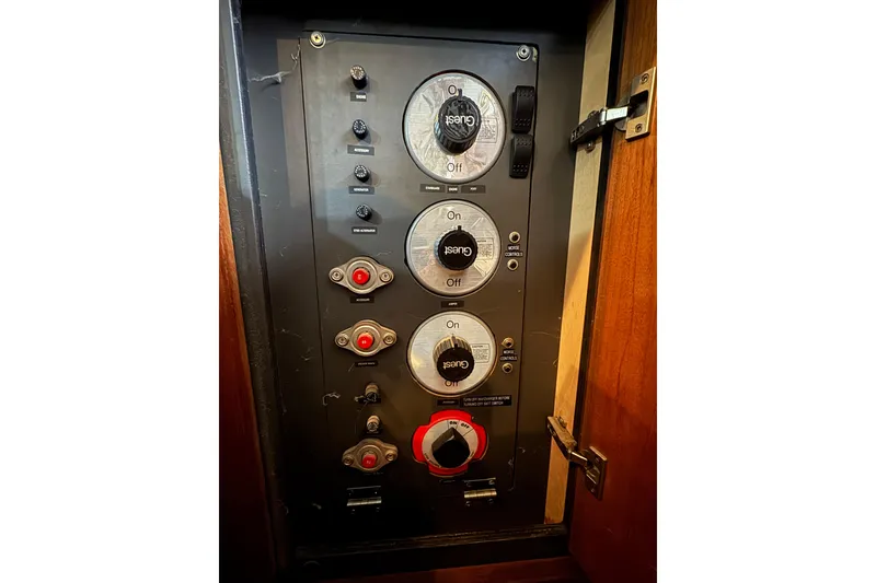 Slide: The Image of Control panel of a 1987 Bayliner 4550 Motoryacht with switches and dials. - 82