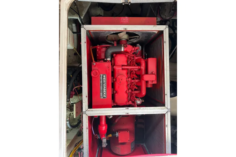 Slide: The Image of Red Westerbeke engine in 1987 Bayliner 4550 Motoryacht, detailed view. - 97