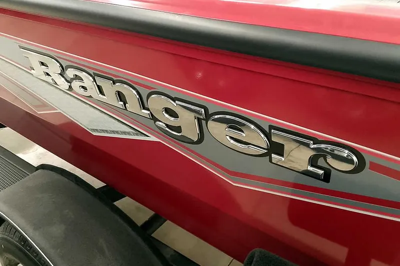 Slide: The Image of Red 2026 Ranger Aluminum VS1665 SC boat with bold logo on the side. - 10