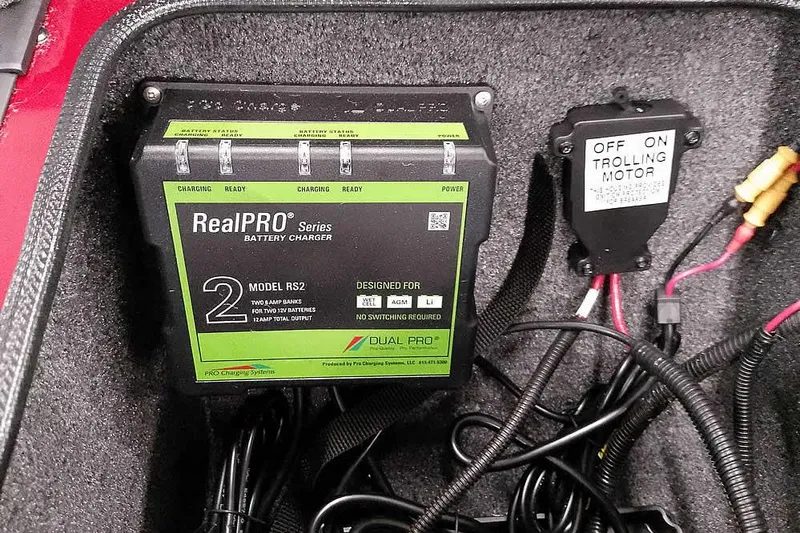 Slide: The Image of RealPRO battery charger and trolling motor switch in Ranger Aluminum VS1665 SC, 2026 model. - 15