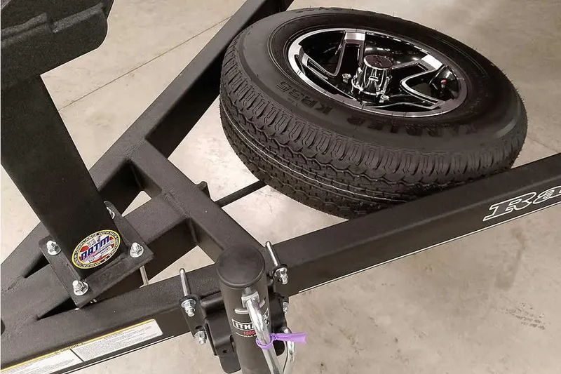 Slide: The Image of 2026 Ranger Aluminum VS1665 SC trailer with spare tire and sturdy frame. - 28