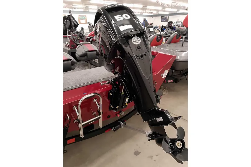 Slide: The Image of 2026 Ranger Aluminum VS1665 SC boat with a 50 HP Mercury outboard motor in showroom. - 4
