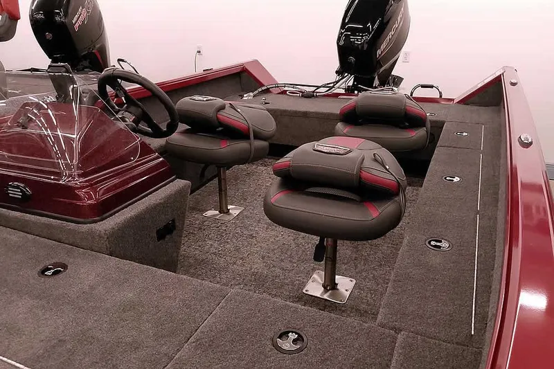 Slide: The Image of 2026 Ranger Aluminum VS1665 SC boat interior with seating and steering console. - 8