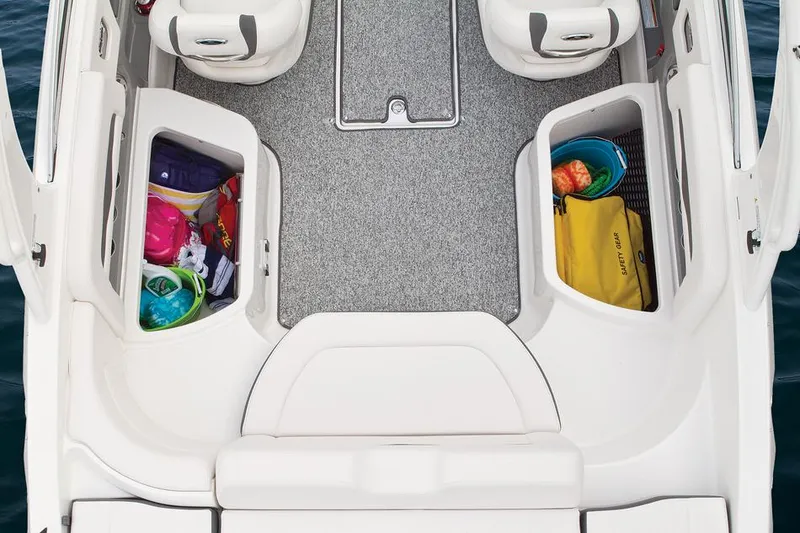 Slide: The Image of Manufacturer Provided Image: 2015 Chaparral 246 SSi boat interior with storage compartments and seating. - 15