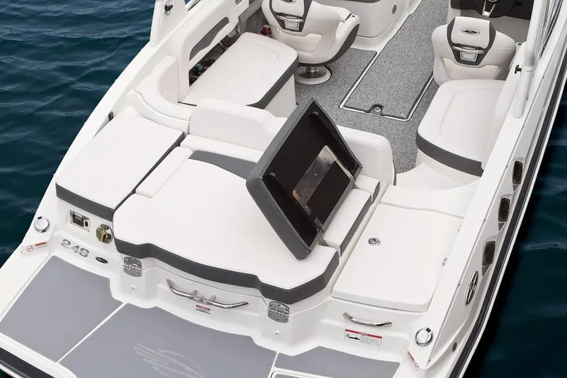 Slide: The Image of Manufacturer Provided Image: 2015 Chaparral 246 SSi boat interior with white seating and gray accents. - 18