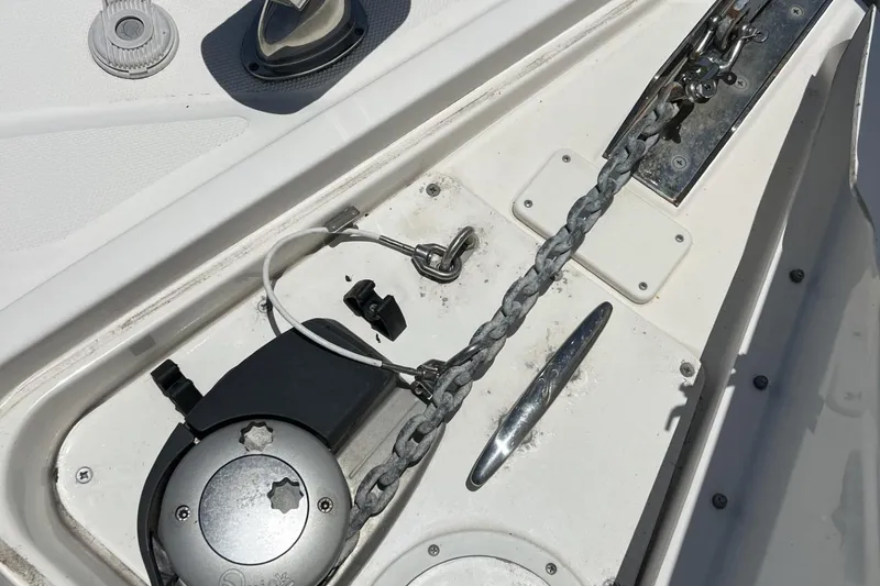 Slide: The Image of 2012 Sea Ray Sundancer anchor chain and deck details. - 15