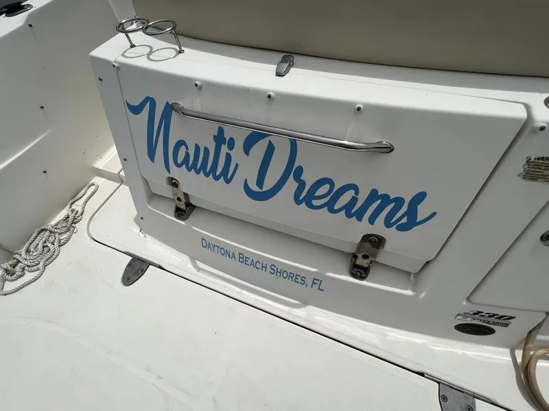 Slide: The Image of Sea Ray Sundancer 2012 boat with "Nauti Dreams" name, Daytona Beach Shores, FL. - 18