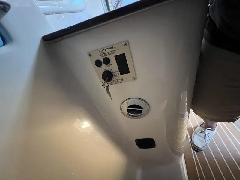 Slide: The Image of Control panel on a 2012 Sea Ray Sundancer boat interior. - 47