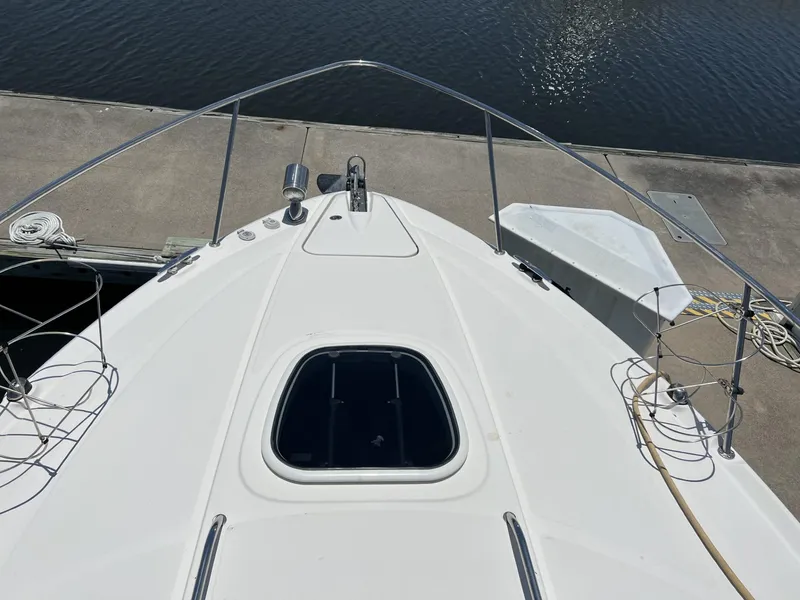 Slide: The Image of 2012 Sea Ray Sundancer boat bow view at dockside. - 5