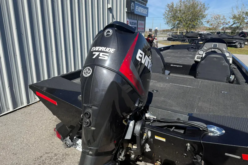 Slide: The Image of 2015 Ranger RT178C boat with Evinrude 75 outboard motor, parked outdoors. - 4