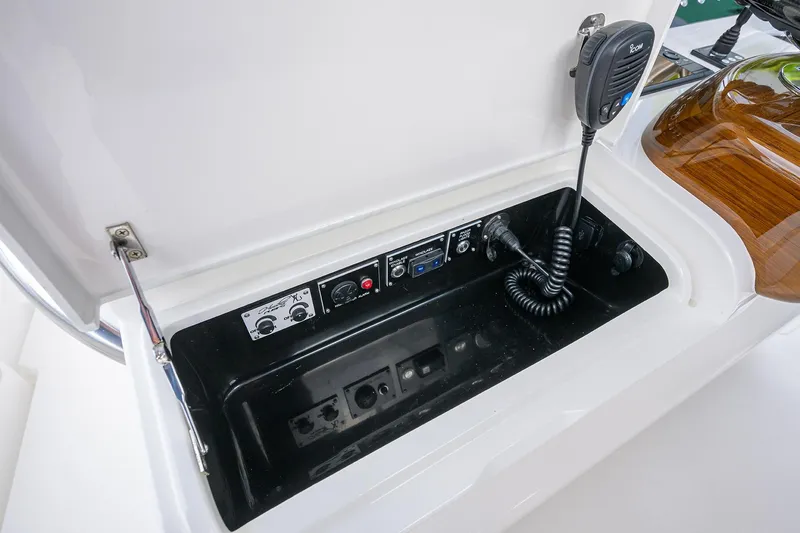 Slide: The Image of 2025 Valhalla Boatworks V-41 control panel with communication equipment and sleek design. - 10