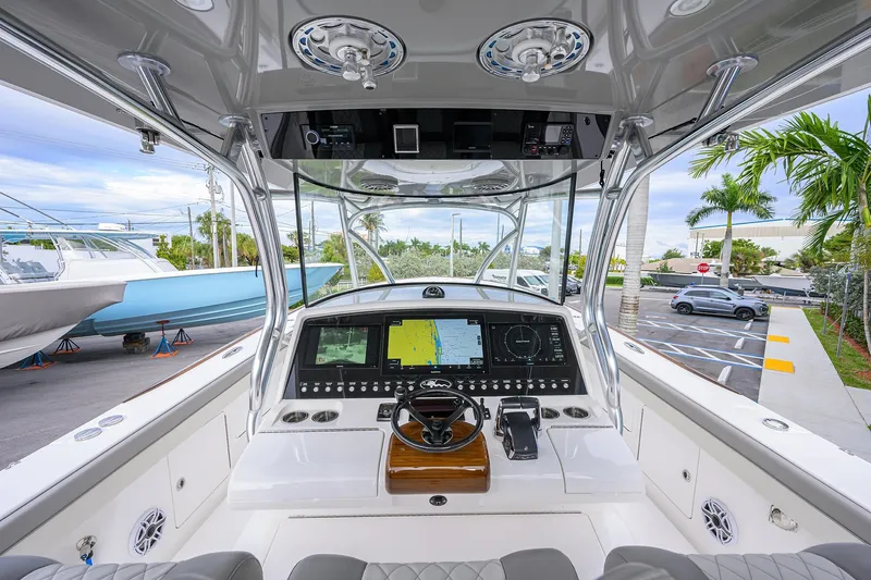 Slide: The Image of 2025 Valhalla Boatworks V-41 helm with advanced navigation system and sleek design. - 11