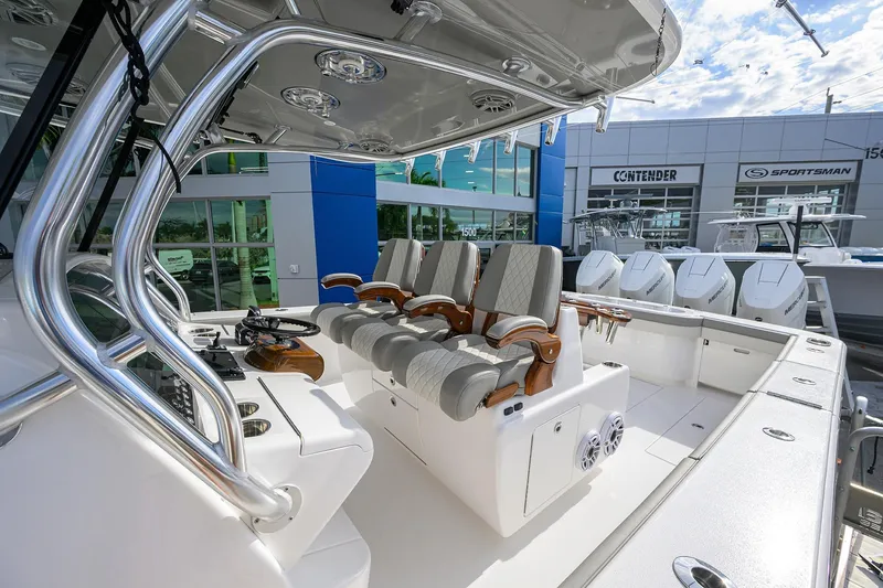Slide: The Image of 2025 Valhalla Boatworks V-41 interior with luxury seating and modern helm controls. - 12