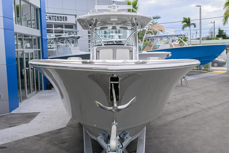 Slide: The Image of 2025 Valhalla Boatworks V-41 displayed at a dealership, showcasing sleek design and modern features. - 3