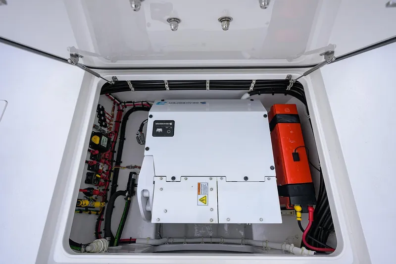 Slide: The Image of 2025 Valhalla Boatworks V-41 electrical compartment with wiring and components. - 36