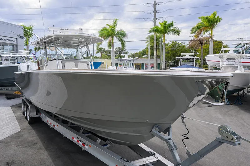 Slide: The Image of 2025 Valhalla Boatworks V-41 on trailer, displayed outdoors with palm trees. - 4