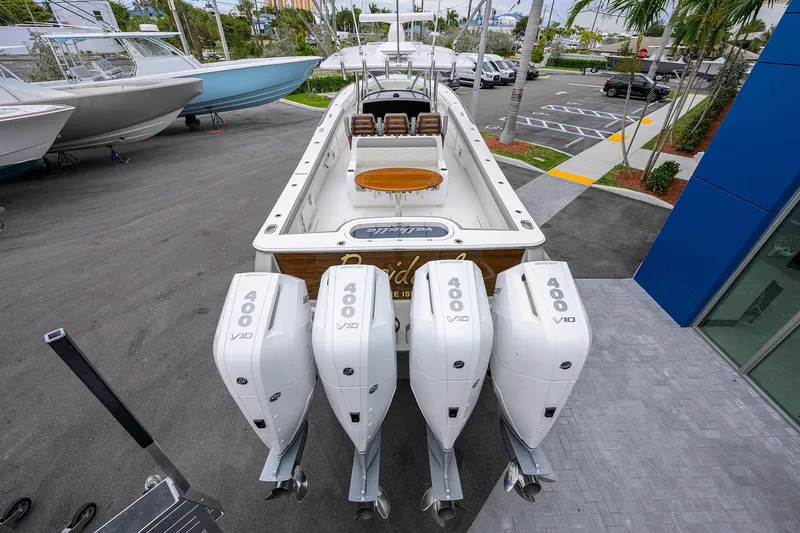 Slide: The Image of 2025 Valhalla Boatworks V-41 with four Mercury 400 V10 engines, docked outdoors. - 7