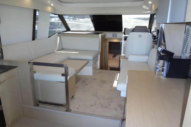 Slide: The Image of Control panel on 2023 Prestige 420S yacht featuring Fusion MS-NRX300 and Glendinning controls. - 19