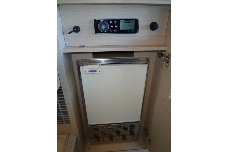 Slide: The Image of Modern kitchen area in 2023 Prestige 420S yacht with stovetop and sink. - 28