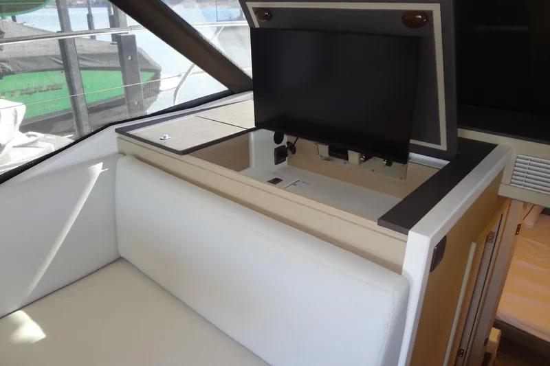 Slide: The Image of Elegant table setting with coffee machine, cups, plates, and cutlery on Prestige 420S yacht. - 34