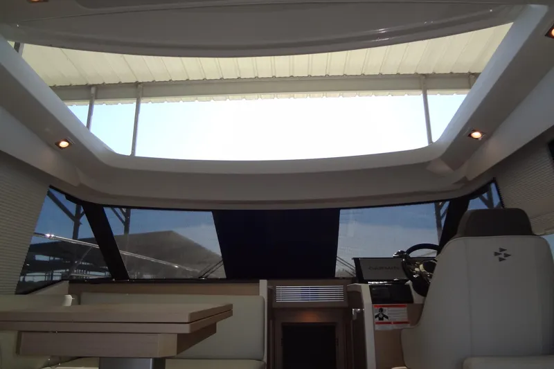 Slide: The Image of Luxurious seating area in 2023 Prestige 420S yacht interior. - 36