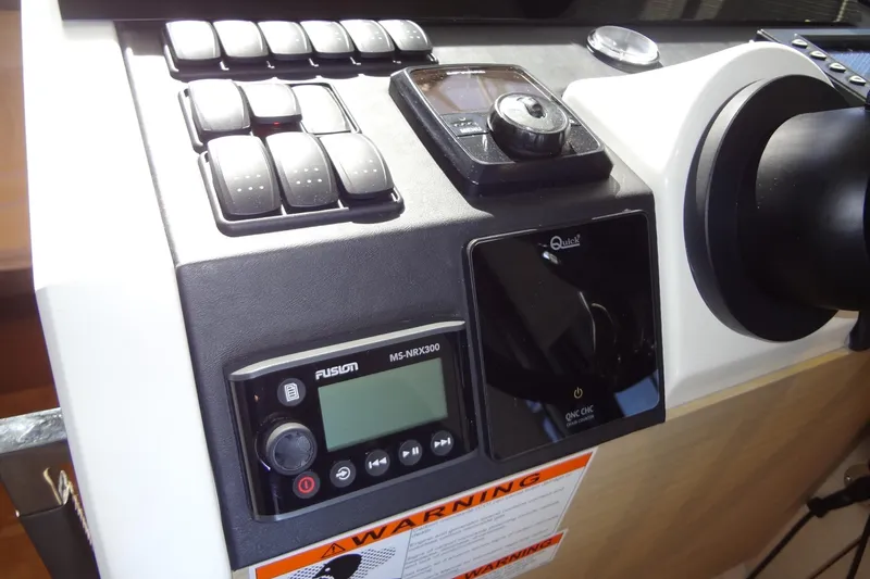 Slide: The Image of Interior view of 2023 Prestige 420S yacht with modern helm and seating area. - 41