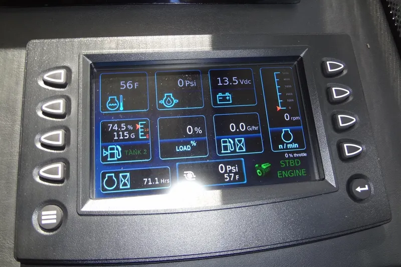 Slide: The Image of 2023 Prestige 420S yacht helm with modern controls and navigation screens. - 44