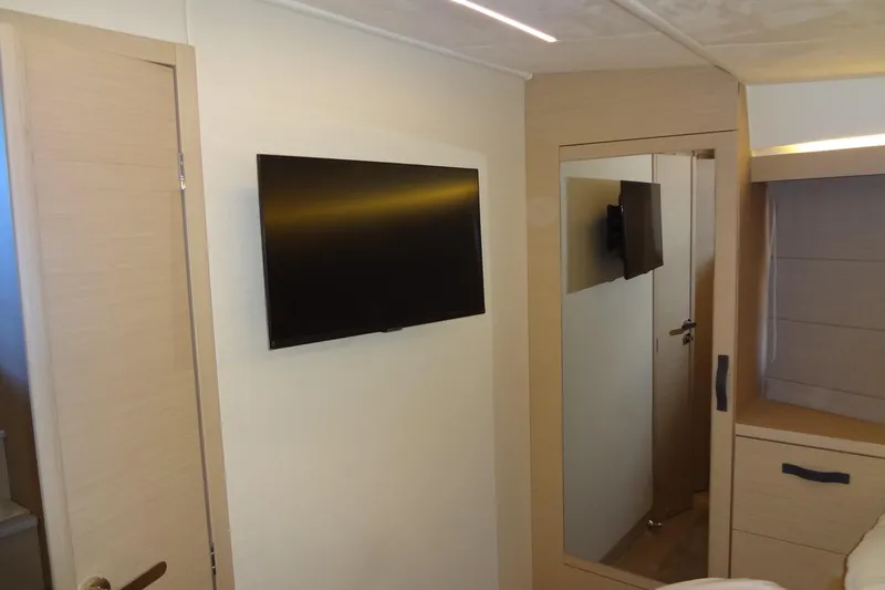 Slide: The Image of Control panel inside 2023 Prestige 420S yacht, featuring switches and digital display. - 53