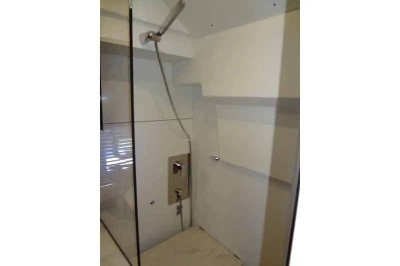 Slide: The Image of Modern interior of 2023 Prestige 420S yacht with wall-mounted TV and mirror. - 58