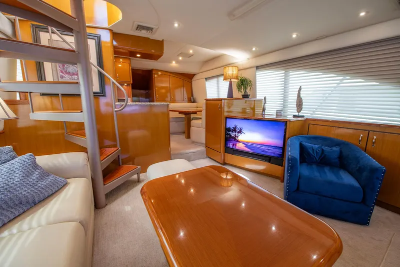 Slide: The Image of Luxurious interior of 2003 Ocean Yachts 62 Super Sport EB with modern furnishings and elegant design. - 29