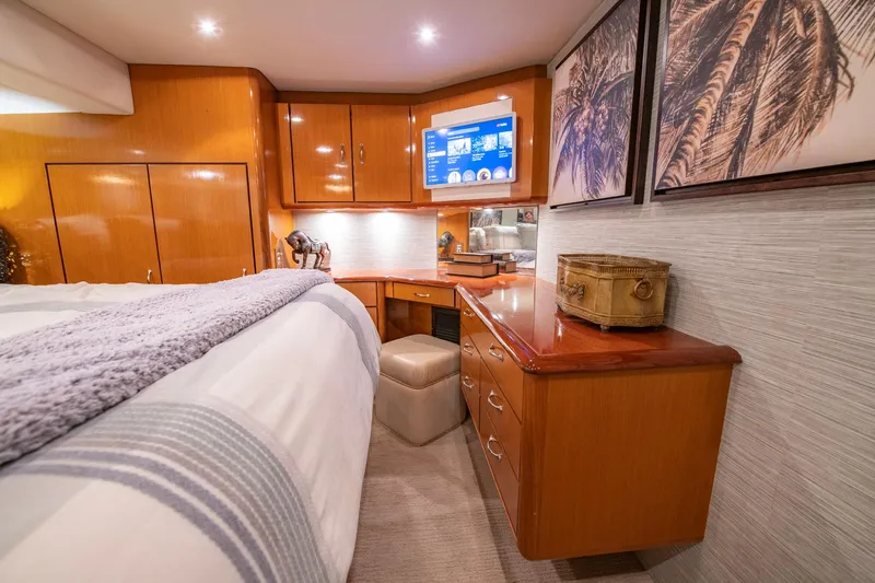 Slide: The Image of Luxurious cabin interior of 2003 Ocean Yachts 62 Super Sport EB with elegant wood finishes. - 38