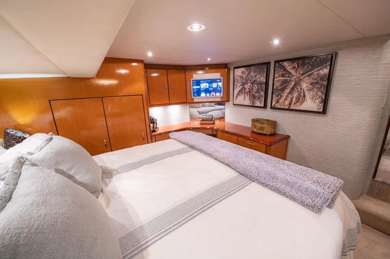 Slide: The Image of Luxurious bedroom interior of 2003 Ocean Yachts 62 Super Sport EB with modern decor. - 39