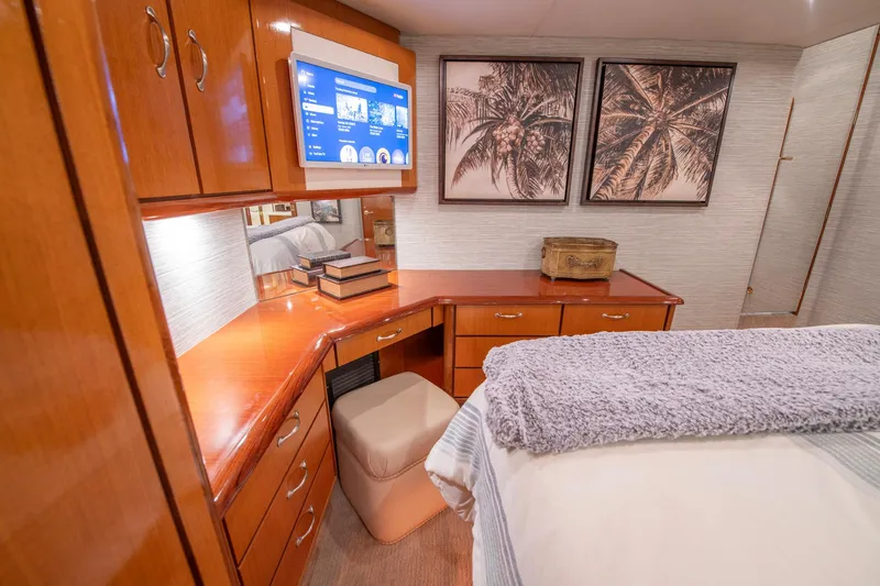 Slide: The Image of Luxurious cabin interior of 2003 Ocean Yachts 62 Super Sport EB with wood cabinetry and modern decor. - 43