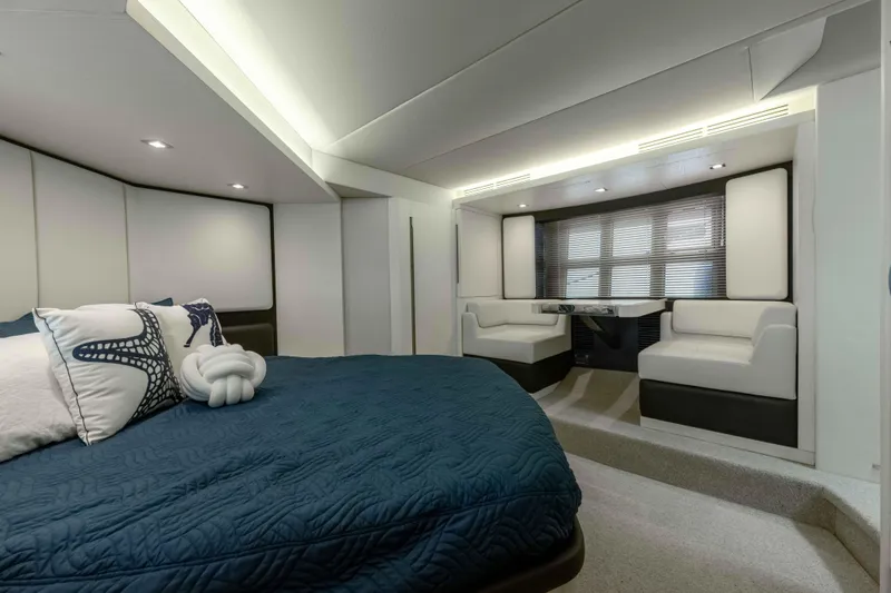 Slide: The Image of Luxurious interior of 2015 Azimut 55S yacht with elegant bedroom and seating area. - 12