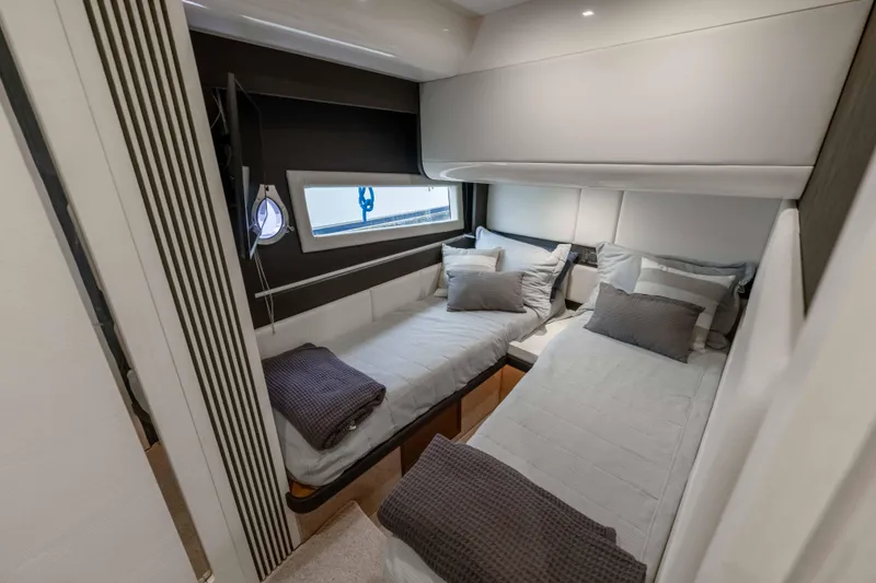 Slide: The Image of Luxurious twin cabin interior of 2015 Azimut 55S yacht with modern decor. - 15