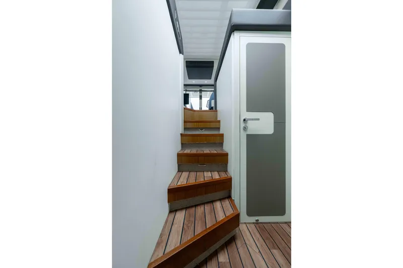 Slide: The Image of Interior stairs of 2015 Azimut 55S yacht with wooden steps and modern design. - 21