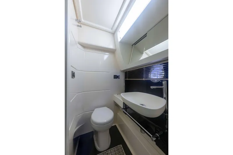 Slide: The Image of Luxurious bathroom in 2015 Azimut 55S yacht with modern fixtures and sleek design. - 27