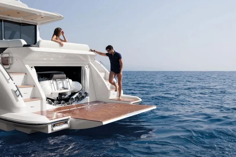 Slide: The Image of Azimut 55S Yacht 2015 on open sea with people on board. - 3