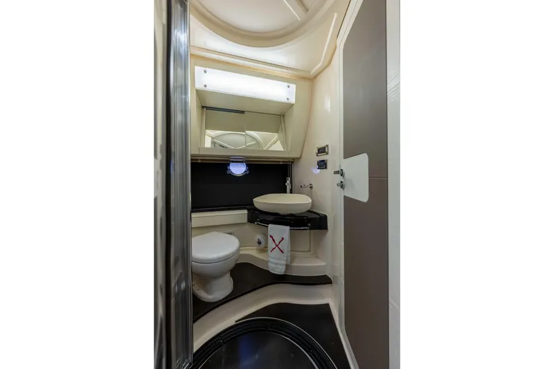 Slide: The Image of Luxurious bathroom in 2015 Azimut 55S yacht with modern fixtures and elegant design. - 31