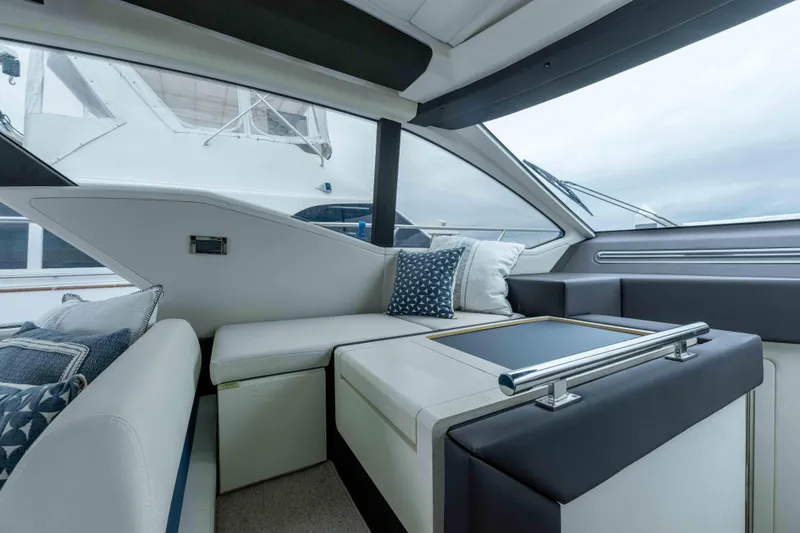Slide: The Image of Luxurious interior of 2015 Azimut 55S yacht with modern seating and cushions. - 33