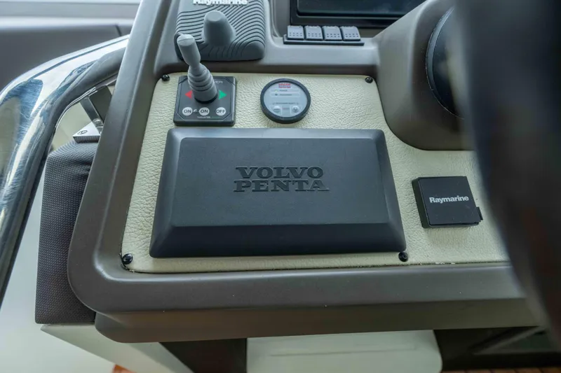 Slide: The Image of Control panel of a 2015 Azimut 55S yacht featuring Volvo Penta and Raymarine equipment. - 40