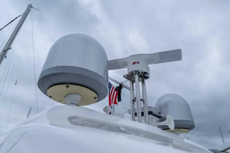 Slide: The Image of Radar and satellite equipment on 2015 Azimut 55S yacht under cloudy sky. - 41