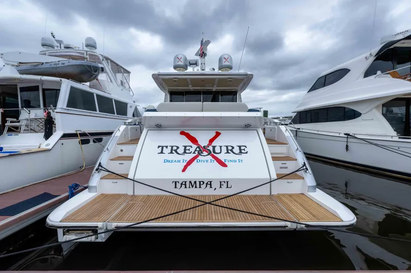 Slide: The Image of 2015 Azimut 55S yacht named "Treasure" docked in Tampa, FL marina. - 44