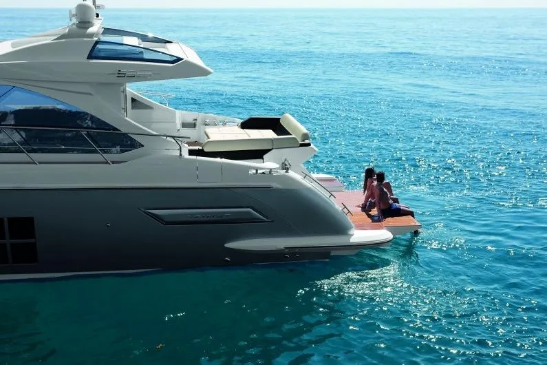 Slide: The Image of Azimut 55S Yacht 2015 on open sea with people on platform. - 5