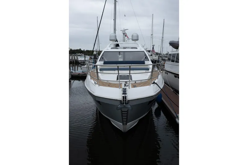 Slide: The Image of 2015 Azimut 55S yacht docked at marina, front view. - 73